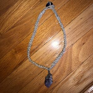 Necklace with rock.